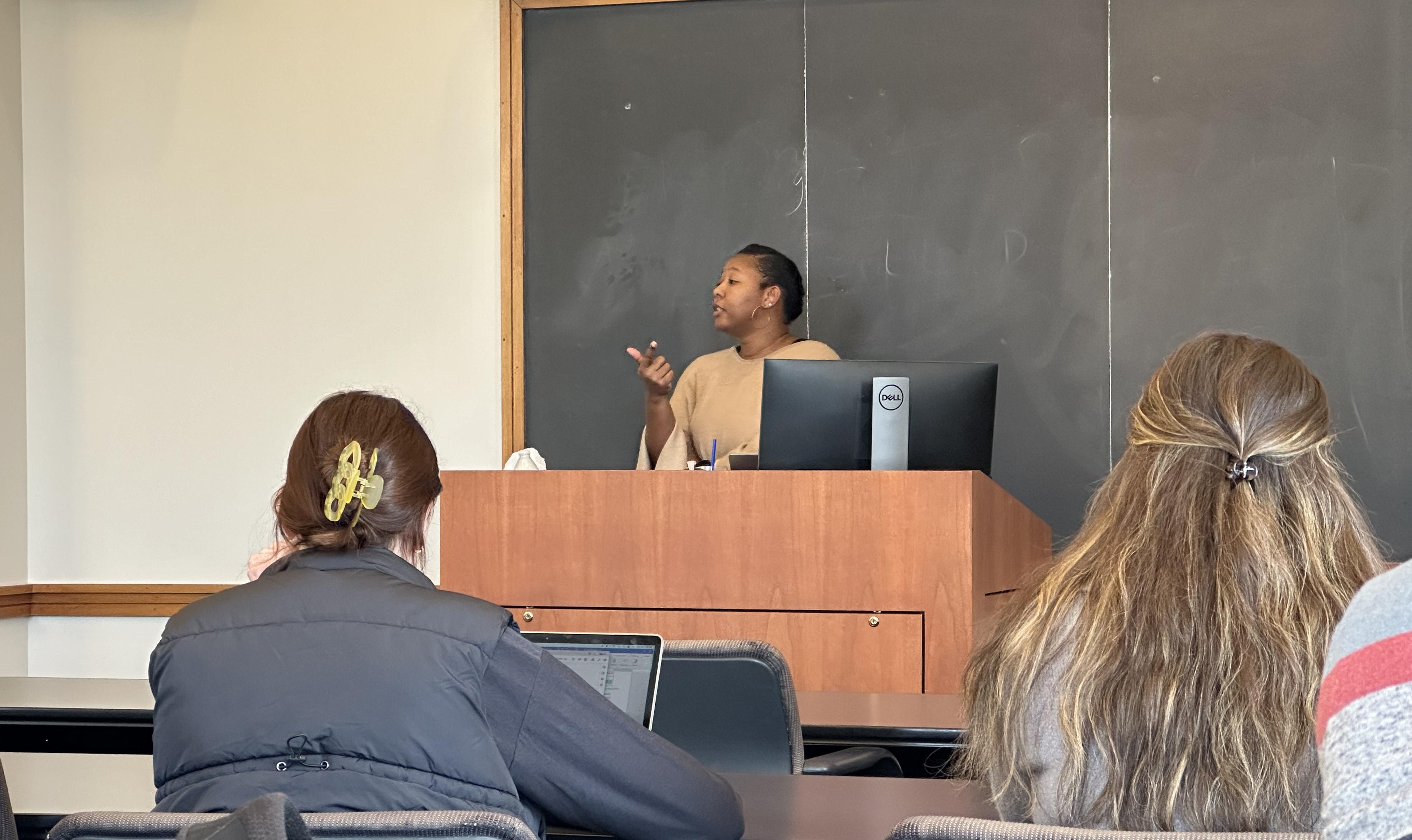 Professor Whitney Holmes teachs students