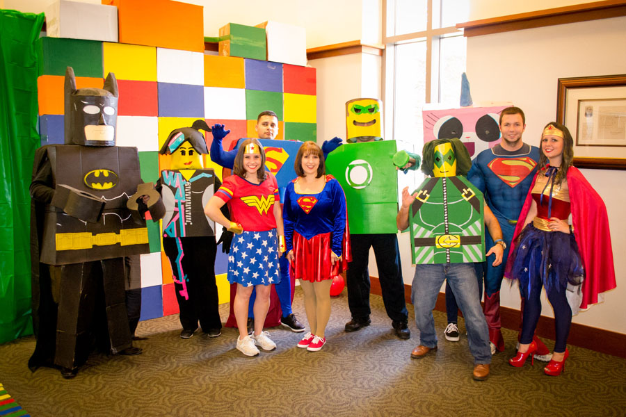 Professors and Students dressed as superheroes for Adoption Day