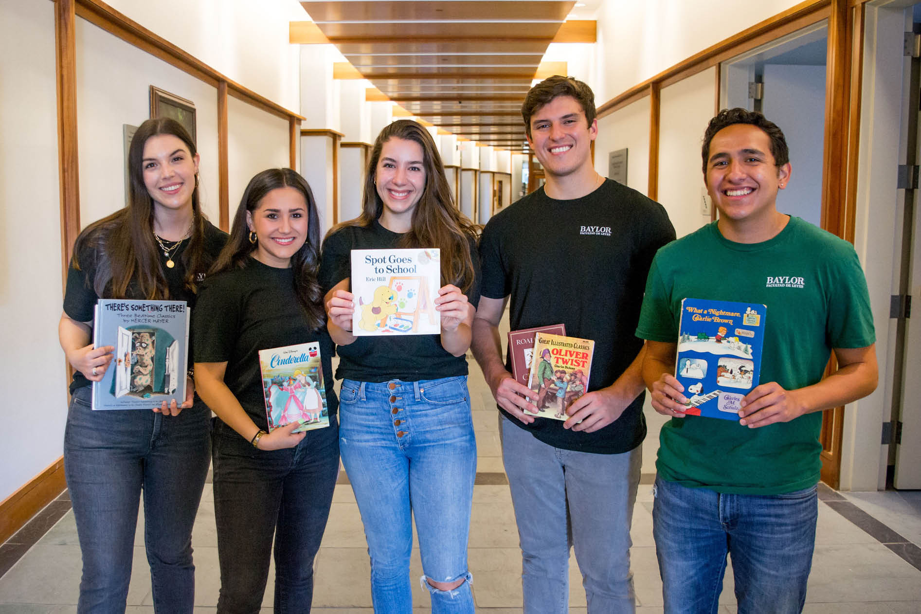HALSA Members pose with books during book drive