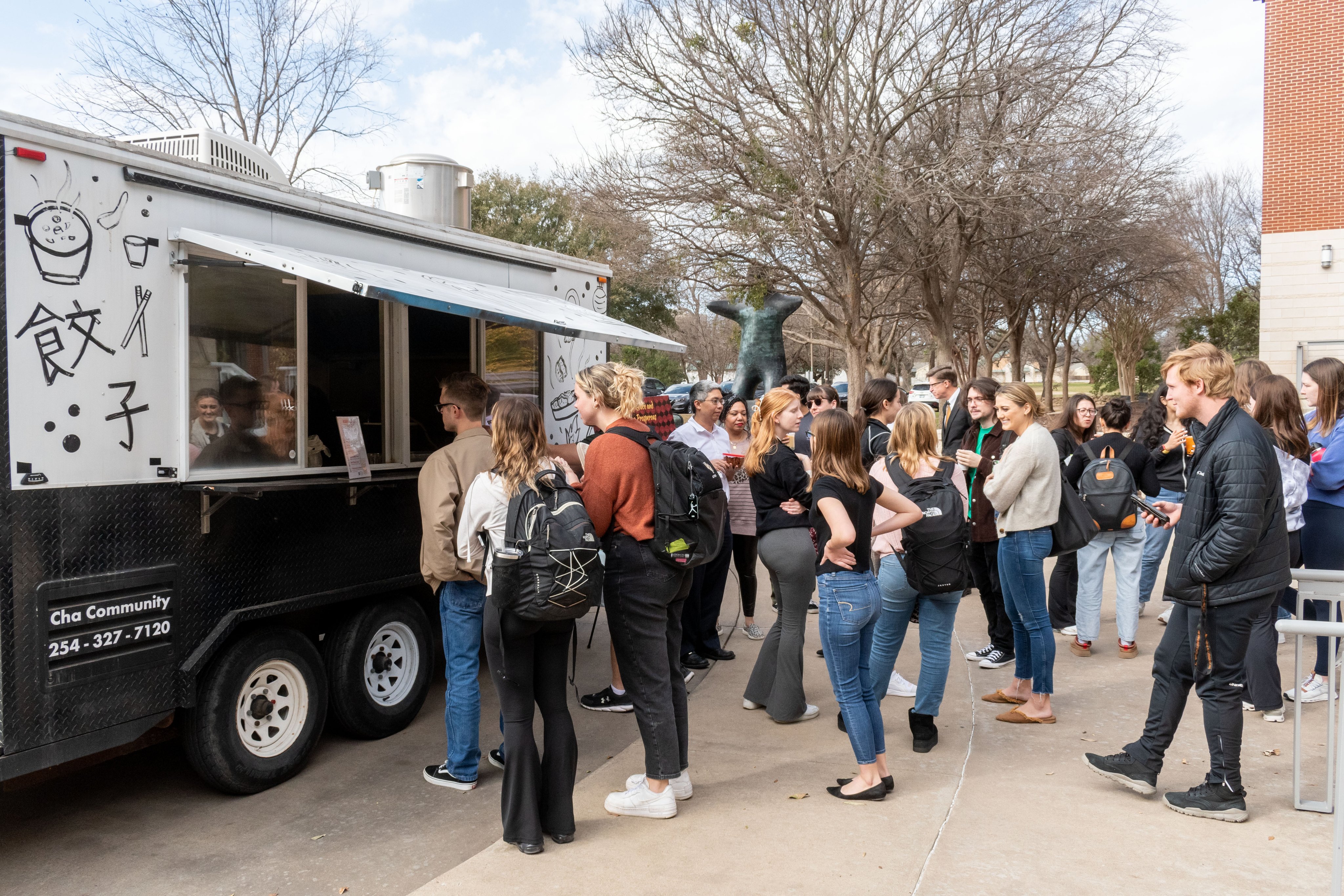 Students line up in front of Waco Cha truck to order Boba tea