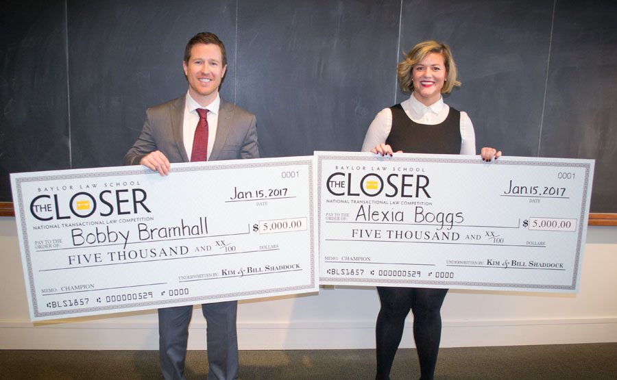 Winners of The Closer Competition pose with oversized checks