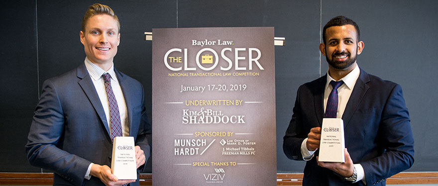 Winners of The Closer 2019 pose with their awards next to The Closer sign