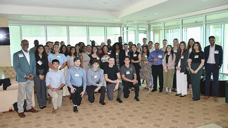 Faculty, Staff, Students, and Alumni pose at the 2023 Incoming Class Diversity Welcome Dinner