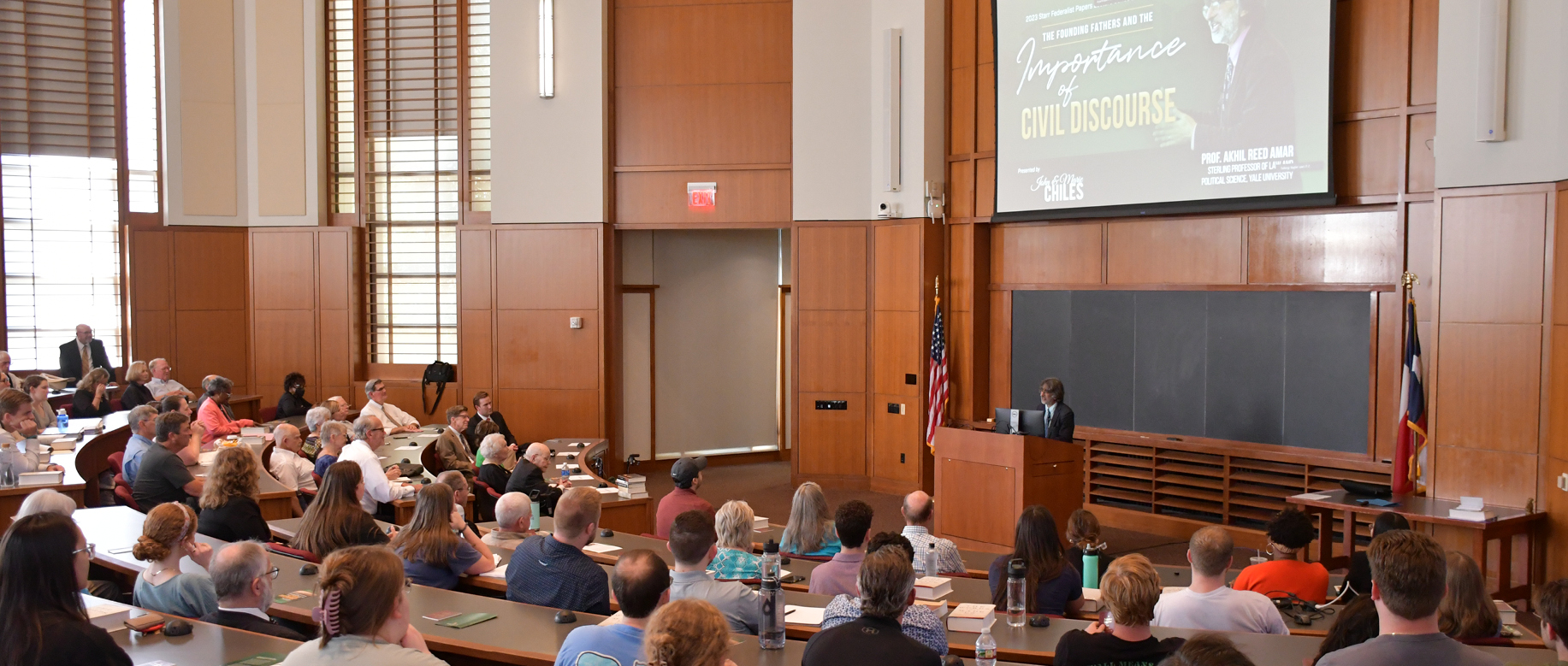 Prof. Amar in front of a large crowd at Baylor Law
