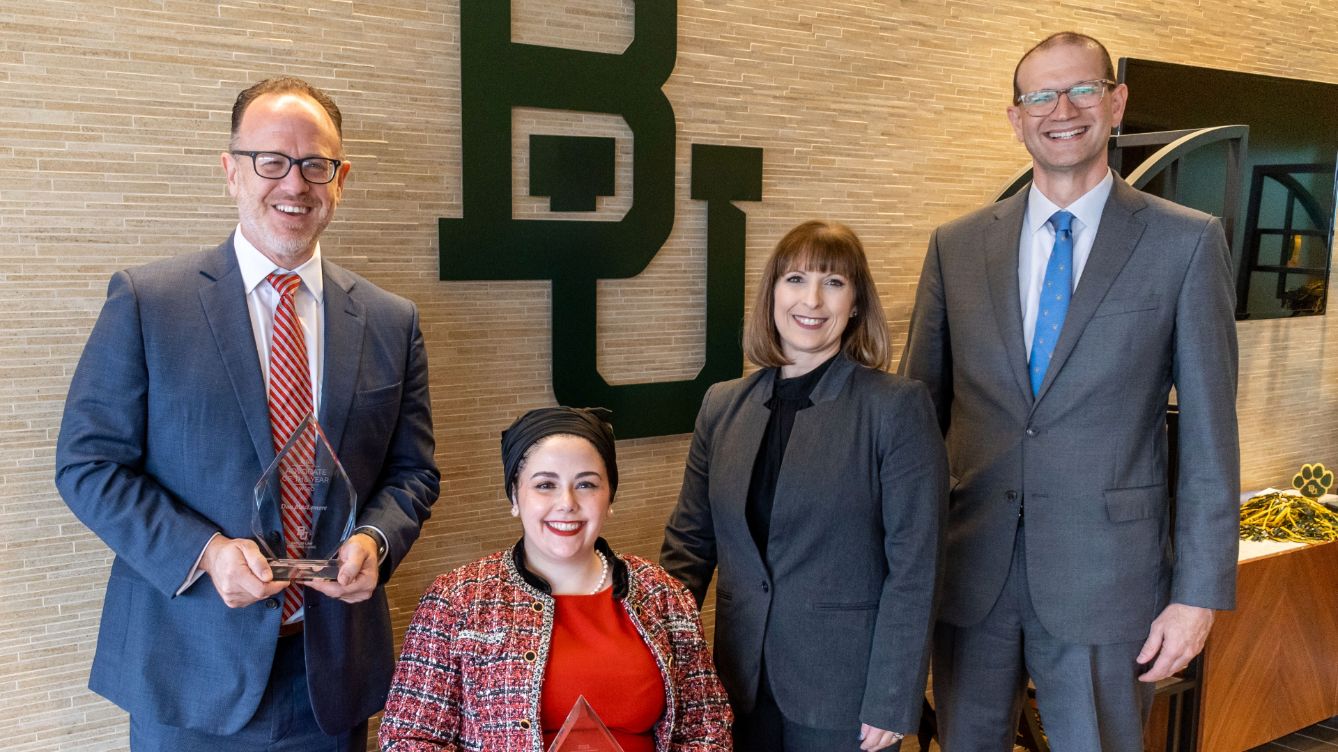 Photo of Dan MacLemore and Hailee Yip (JD ’18) with Professor of Law Bridget Fuselier and Director of Clinical and Pro Bono Programs and Clinical Lecturer Josh Borderud