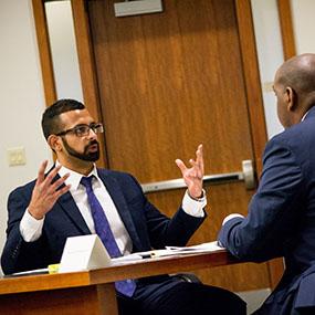 Rajdeep Roger Bains of the University of San Diego School of Law makes a point during the competition