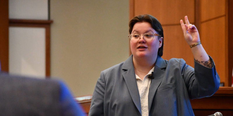 Top Gun XVI Speaking in front of Jury, Hand raised