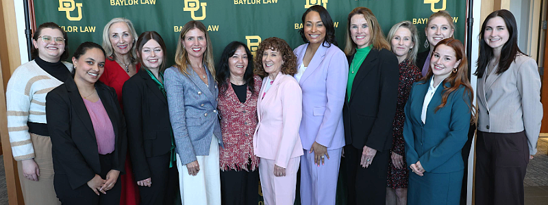 Panelists and Table Hosts pose together after the 2026 'Off the Record' Event at Baylor Law School